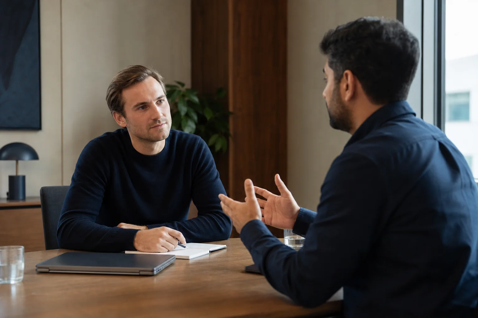 A startup founder listening during a customer discovery conversation